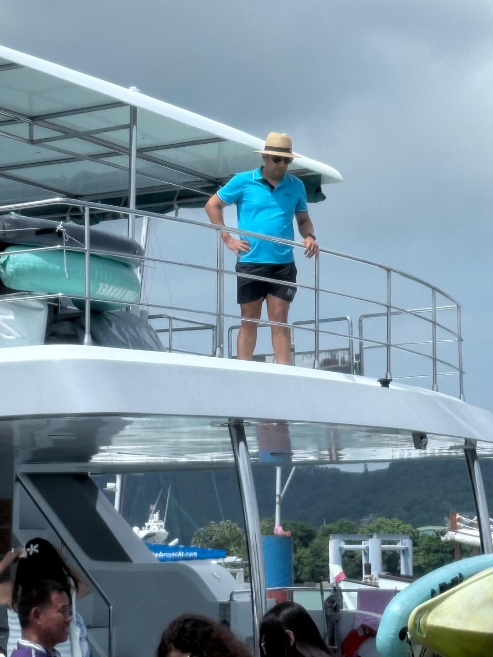 On the upper deck of the catamaran